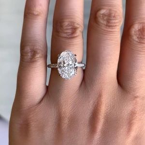 PLATINUM OVAL CUT 5 CARAT ENGAGEMENT RING